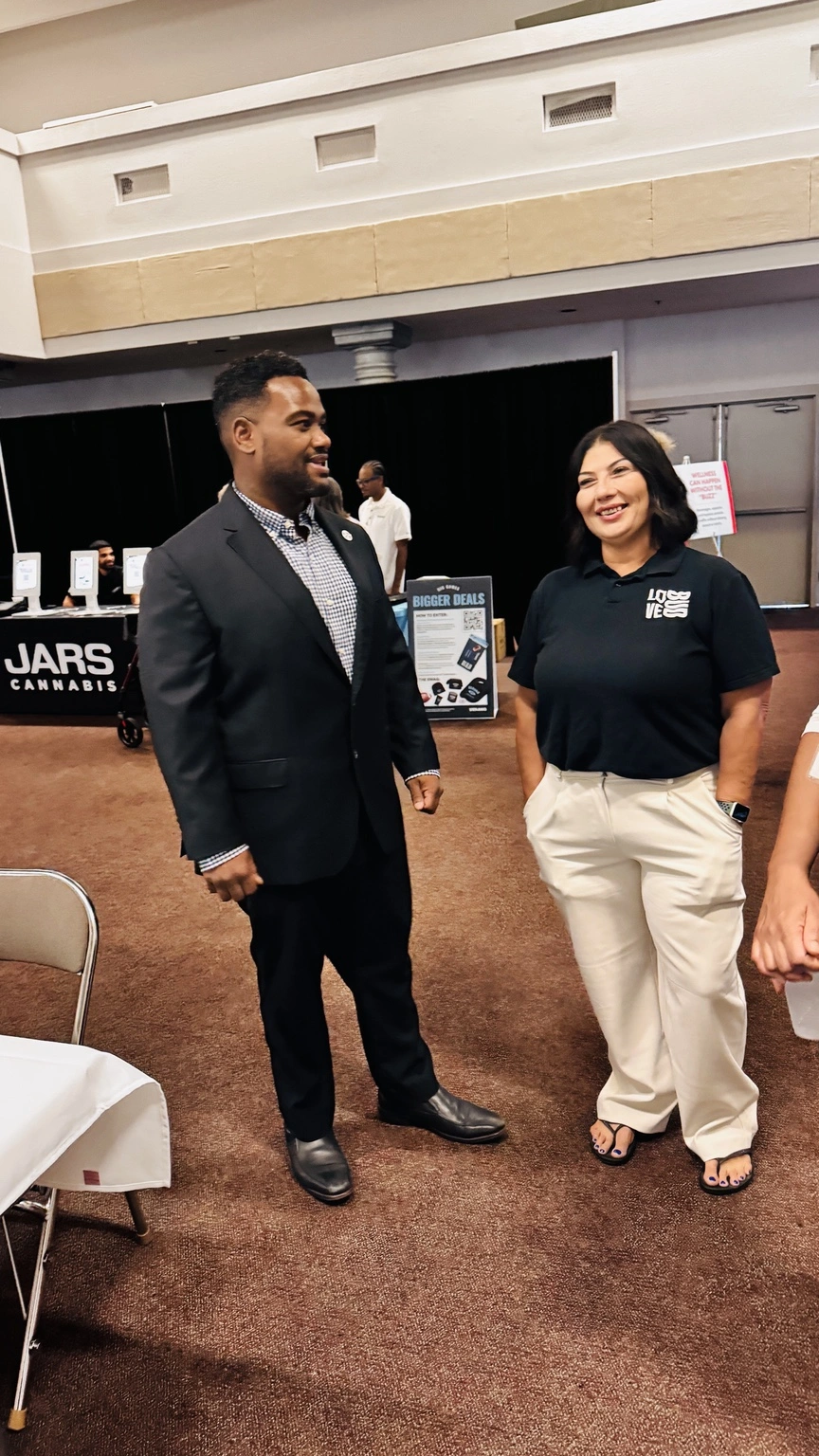 LoveBud Founder and CEO James Watkins with Human Resources Manager Isabel Garza at a business event