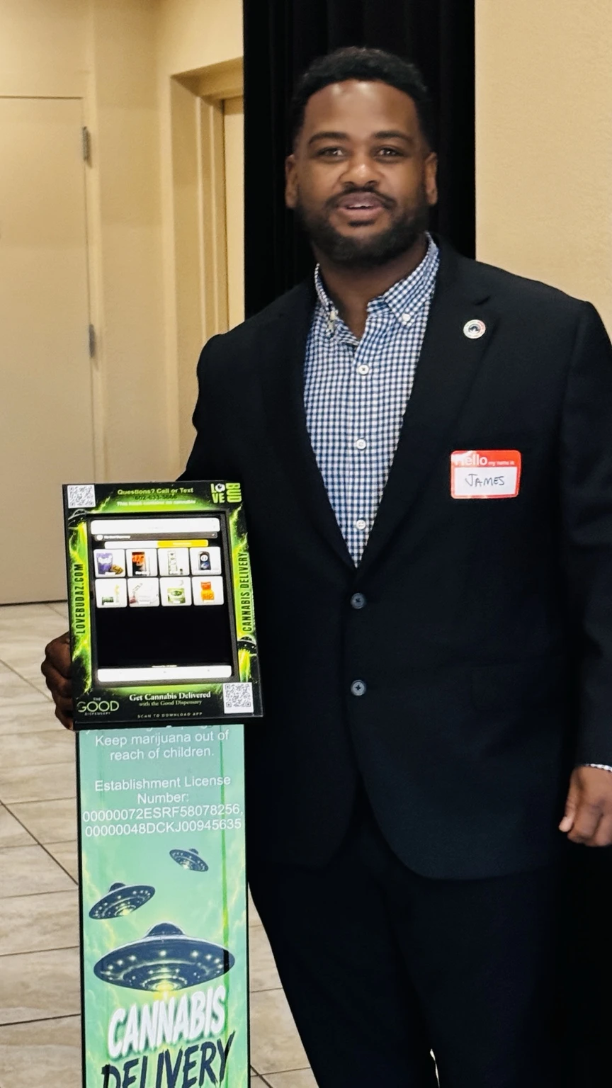 A LoveBud representative presenting a kiosk at a local event